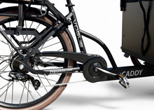 Afbeelding in Gallery-weergave laden, Detail van het zwarte frame en de achterwielmotor van de BakFietsenWinkel Vogue Caddy elektrische bakfiets
